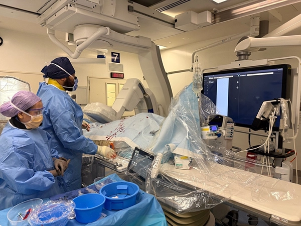 Dr Sela Koyamaibole performing a lower limb endovascular revascularisation procedure 